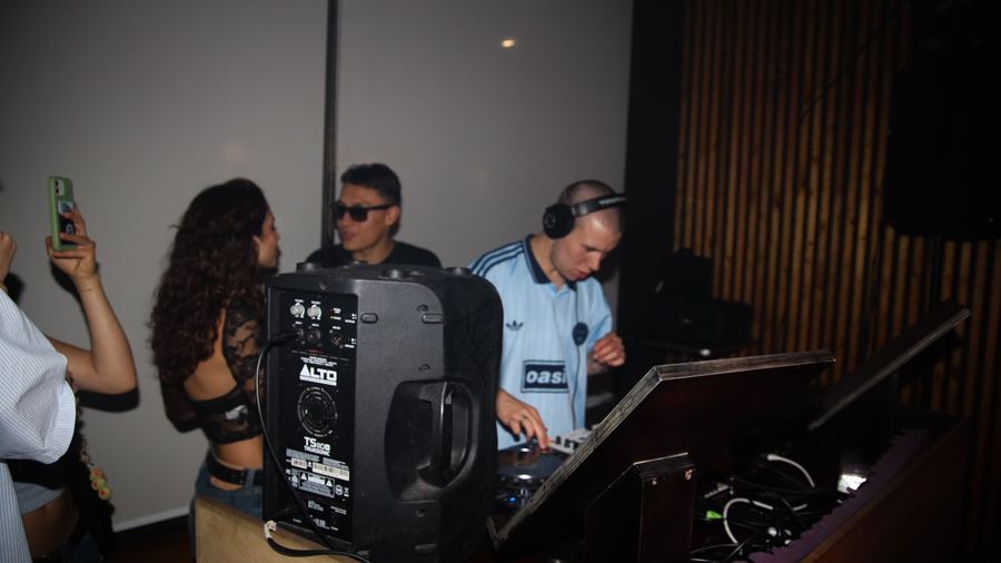 Dougal DJing with friends in the booth